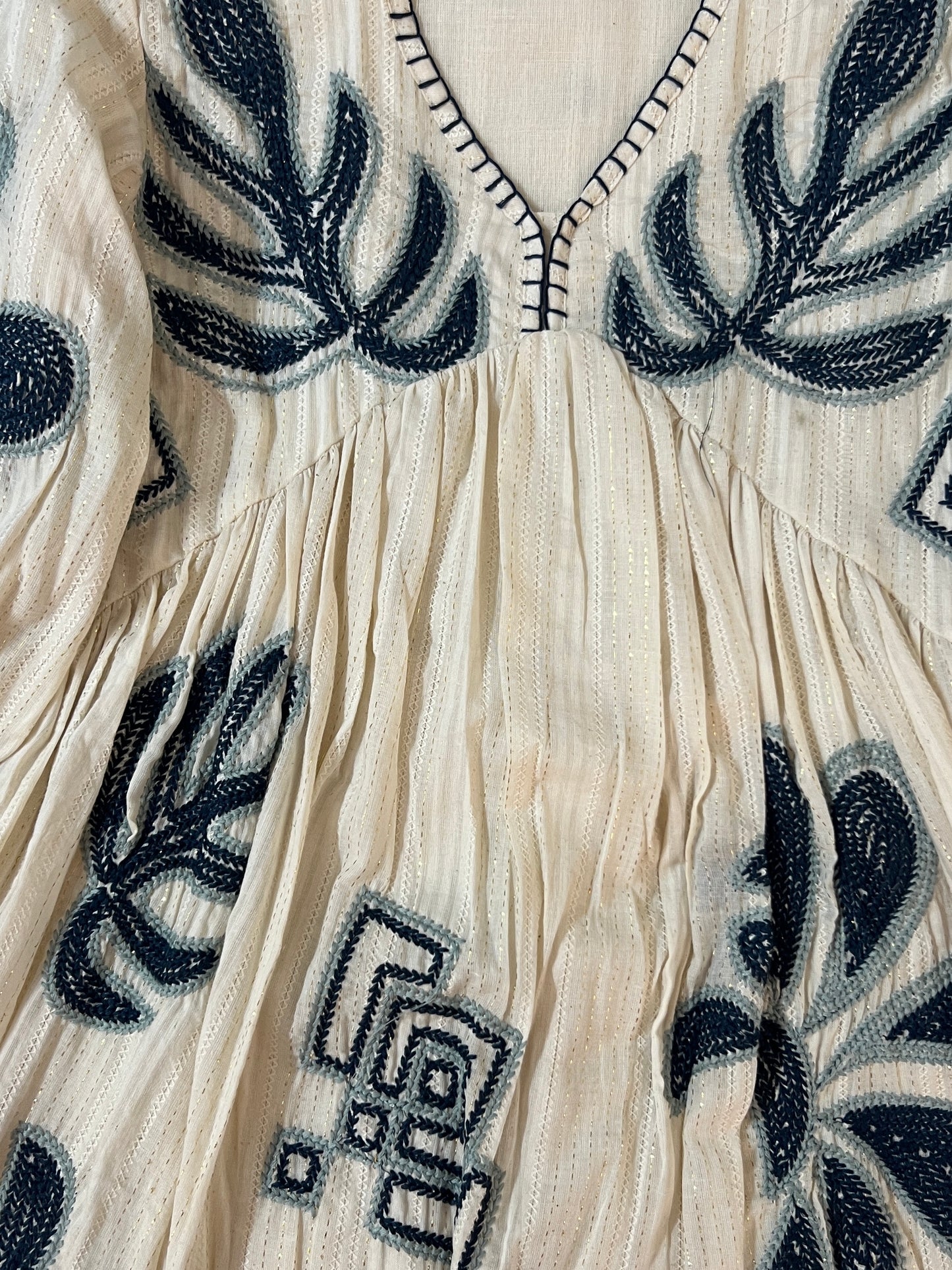 White embroidered short tunic