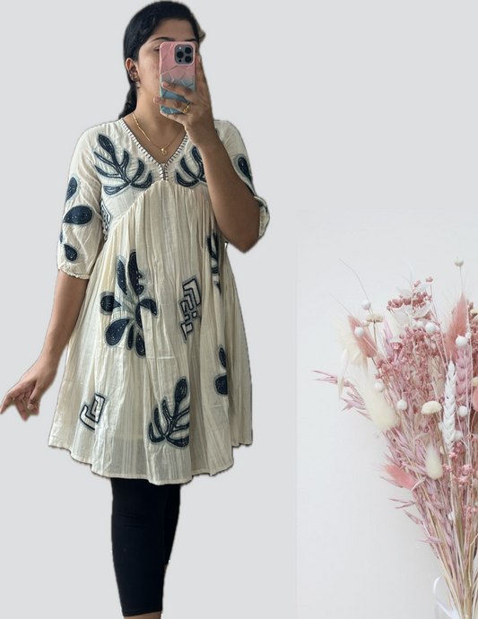 White embroidered short tunic